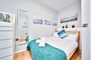 2 bedrooms, desk, iron/ironing board, travel cot