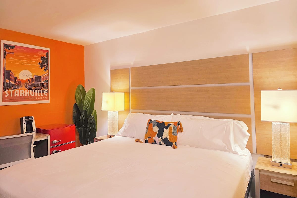 Desk, laptop workspace, blackout curtains, iron/ironing board