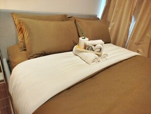 Comfort Condo, Kitchen, City View | 1 bedroom, hypo-allergenic bedding, laptop workspace, iron/ironing board - Air Residences-CBD view  (Makati)
