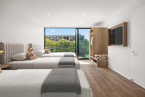 Studio Deluxe, Plusieurs lits | Espace de travail pour ordinateurs portables, système d’insonorisation
