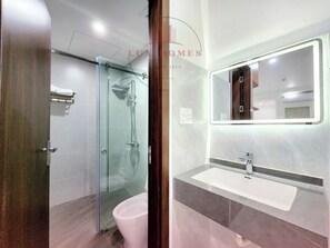 Deluxe Apartment, City View | Bathroom | Shower, free toiletries, hair dryer, slippers - LuxHomes Apartment (Hai Phong)