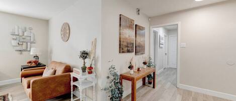 Smart TV, fireplace, books, computer monitors