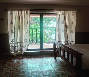 Chambre Quadruple Familiale, vue jardin | Vue depuis le balcon