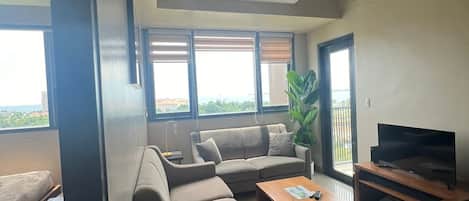 Economy Condo, Balcony, Sea View | Living area