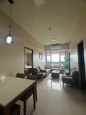 Living area - Executive 1BR One Manchester Place (Lapu-Lapu)