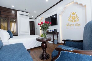 Habitación doble Deluxe, vista a la ciudad | Sábanas de algodón egipcio, ropa de cama de alta calidad y minibar
