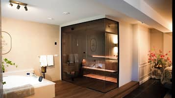 Jetted tub, hair dryer, towels, soap