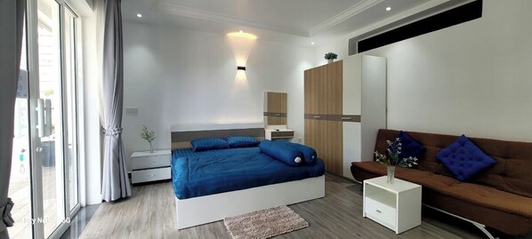 Habitación básica doble, 1 cama King size, vista al jardín | Ropa de cama