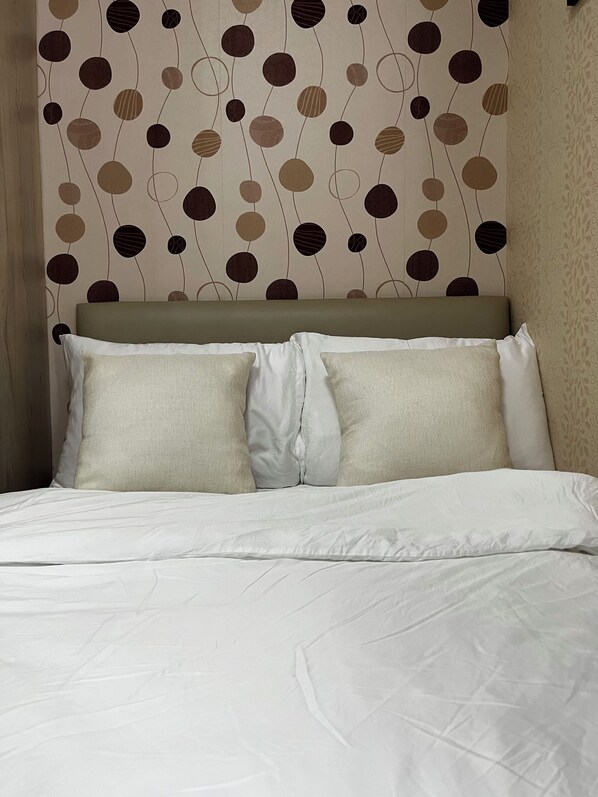1 chambre, fer et planche Ă repasser, Wi-Fi, draps fournis