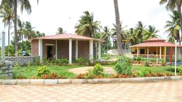 Premium Cottage, Balcony, Garden View | Garden view