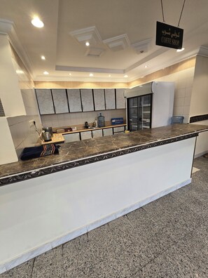 Fridge, microwave, oven, cookware/dishes/utensils