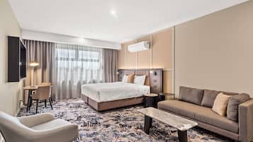 In-room safe, desk, laptop workspace, iron/ironing board