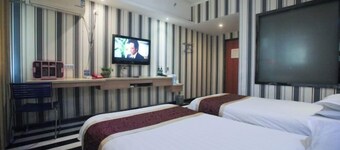 Yining V8 Business Hotel (Teachers University)