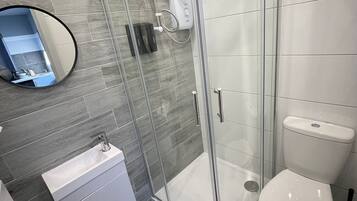 Shower, towels, soap, shampoo