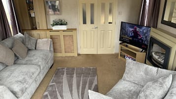 Cabin | Living area | TV, fireplace