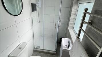 Shower, towels, soap, shampoo