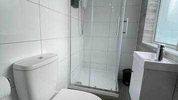 Shower, towels, soap, shampoo