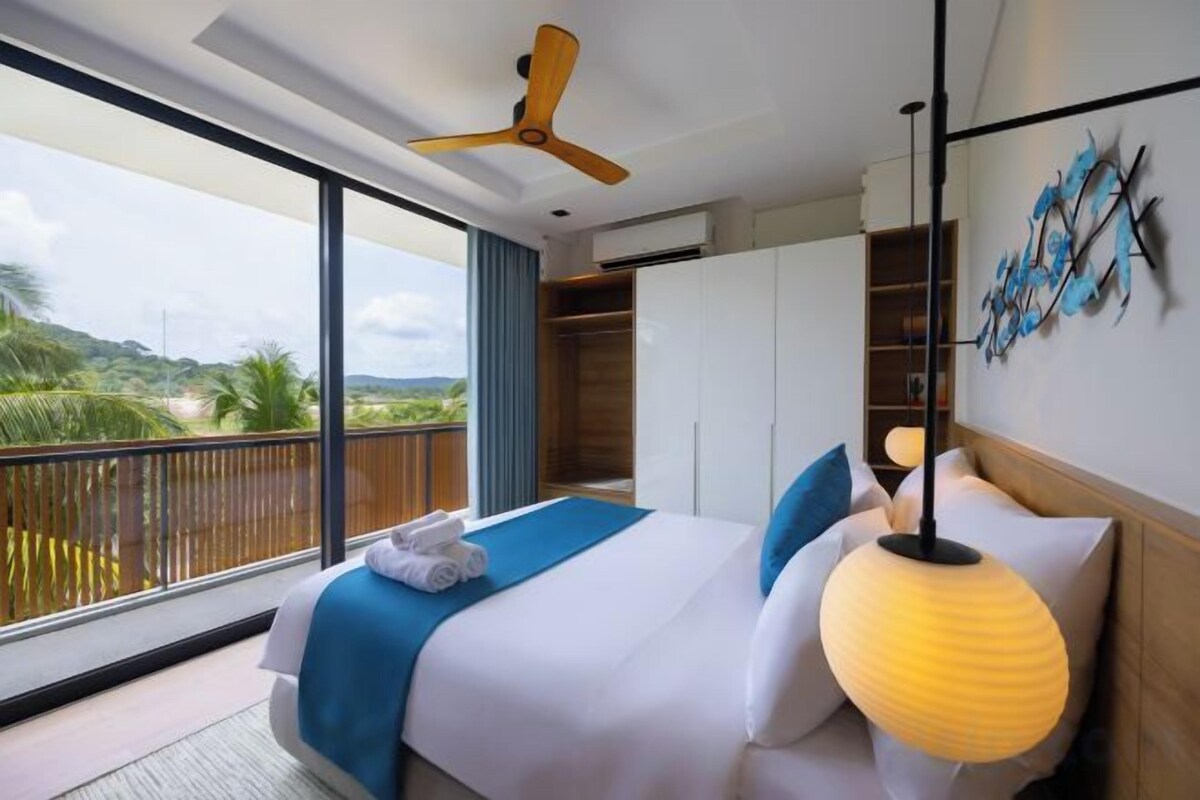 Memory-foam beds, minibar, desk, laptop workspace