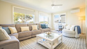 Smart TV, books - 16 Grandview Cl - beautifully styled and equipped home with water views (Soldiers Point)