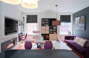 Apartamento | Zona de estar | Una televisión