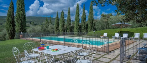 Seasonal outdoor pool, pool umbrellas, pool loungers
