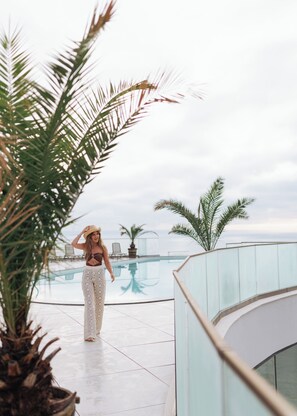Indoor pool, seasonal outdoor pool, pool loungers, lifeguards on site