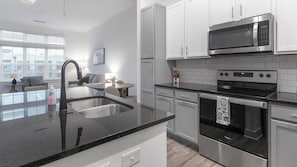 Fridge, microwave, oven, stovetop - Landing | Modern 1BD, Yoga Studio, Pool (Jacksonville)