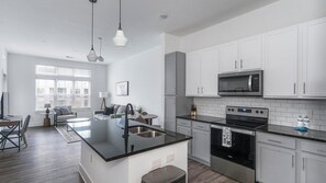 Fridge, microwave, oven, stovetop - Landing | Modern 1BD, Yoga Studio, Pool (Jacksonville)