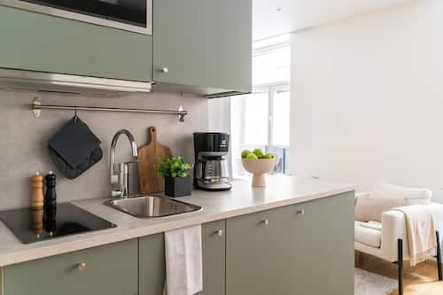 Departamento | Cocina privada | Refrigerador con congelador, horno y parrilla de estufa