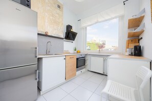 Apartment, 2 Bedrooms, Balcony | Private kitchen - Apartment in Downtown Warsaw by Renters (Warsaw)