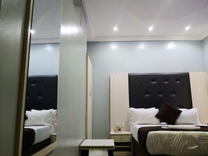 Deluxe Room, Balcony, City View | Desk, laptop workspace, free WiFi