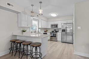 Fridge, stovetop, coffee/tea maker, high chair - A Walk on the Beach "Uptown" - your toes in sand within 200 ft.  Ocean view! (Atlantic Beach)