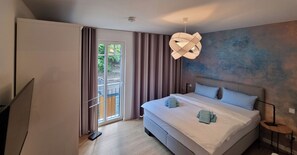 2 chambres, fer et planche à repasser, Wi-Fi, draps fournis