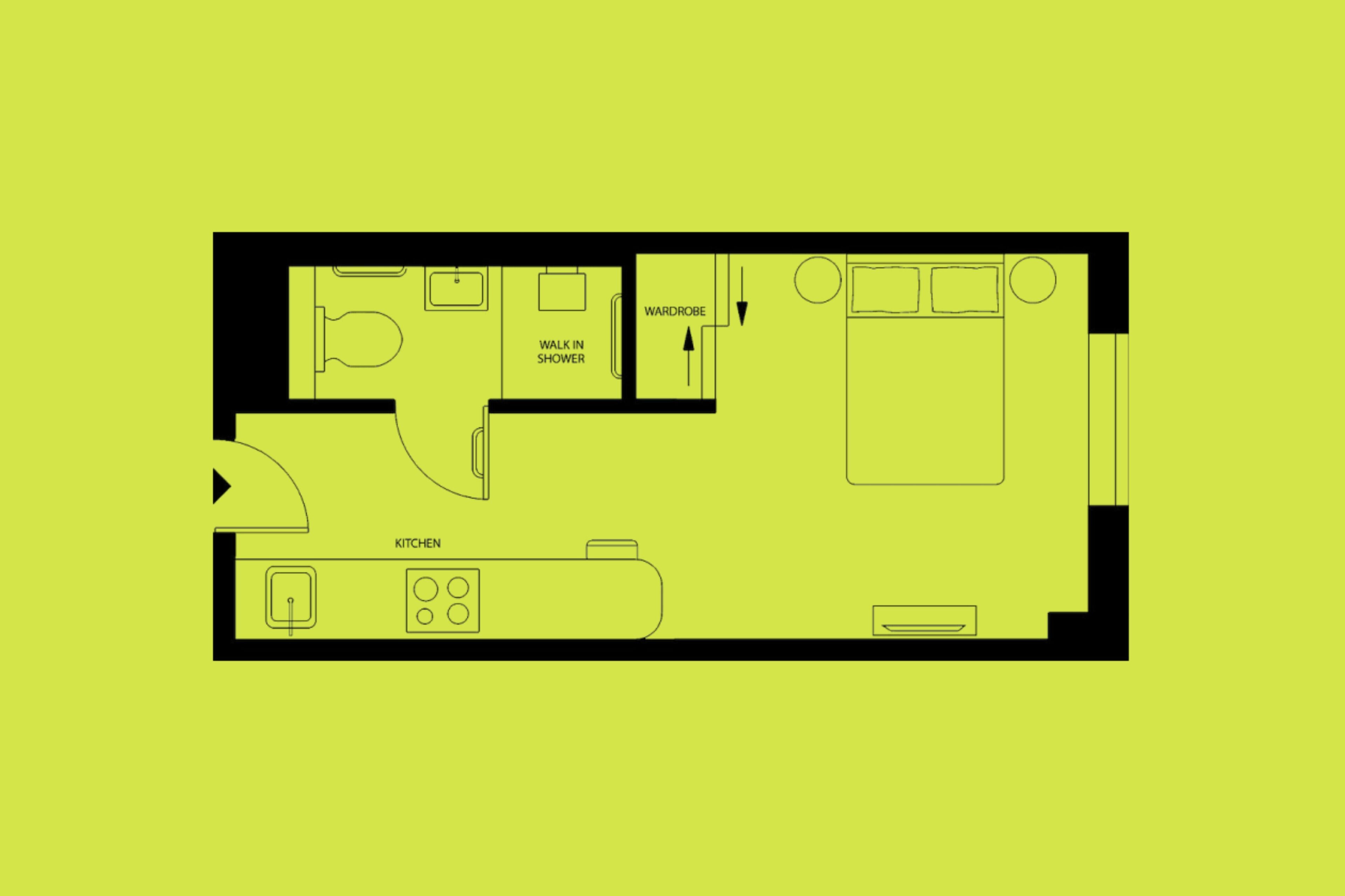 A floor plan of a hotel room with a kitchen area, a walk-in shower, a wardrobe, and a bed.