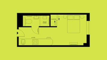 A floor plan of a hotel room with a kitchen area, a walk-in shower, a wardrobe, and a bed.