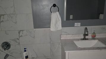 Jetted tub, hair dryer, towels, soap