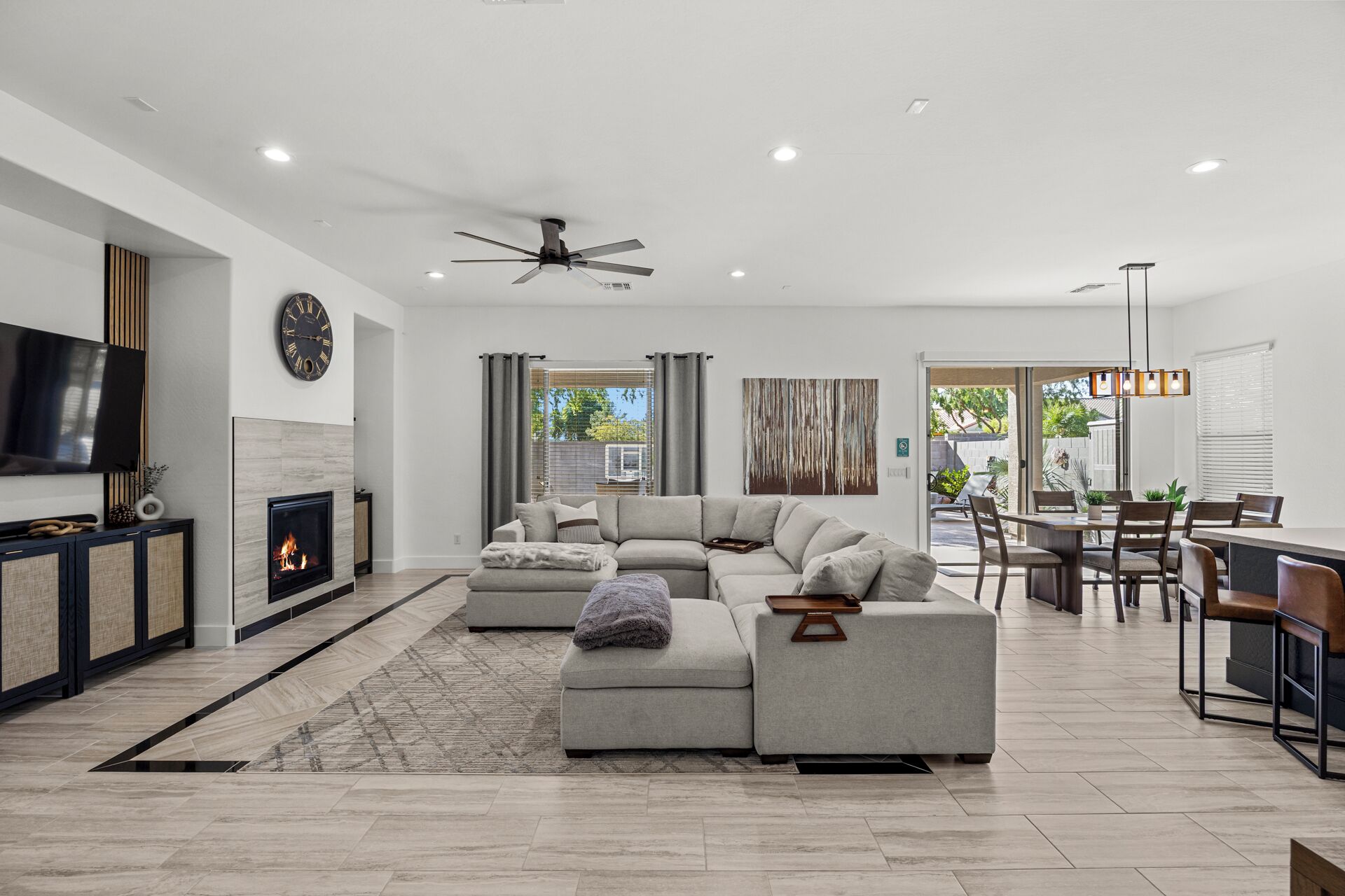 Smart TV, fireplace, books, offices