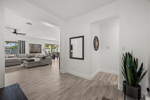 Smart TV, fireplace, books, offices