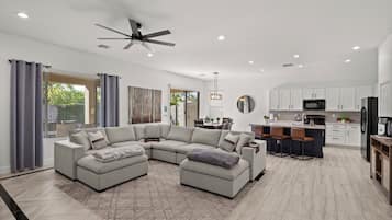 Smart TV, fireplace, books, offices