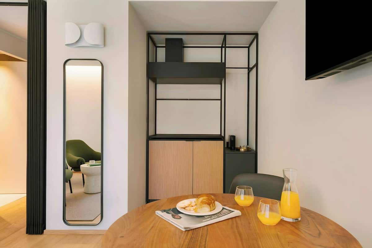Mini-fridge, coffee/tea maker, electric kettle, cookware/dishes/utensils