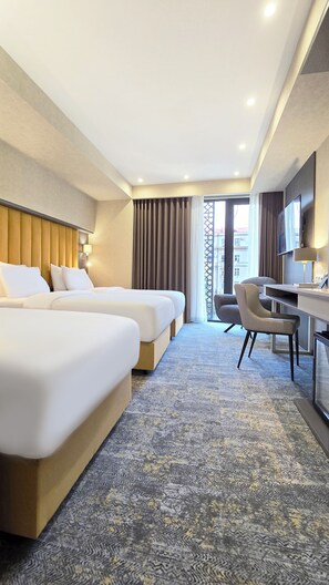 Standard Triple Room | Minibar, in-room safe, soundproofing, iron/ironing board - Griffin Hotel (Tbilisi)