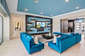 Televisión, videojuegos, mesa de ping pong