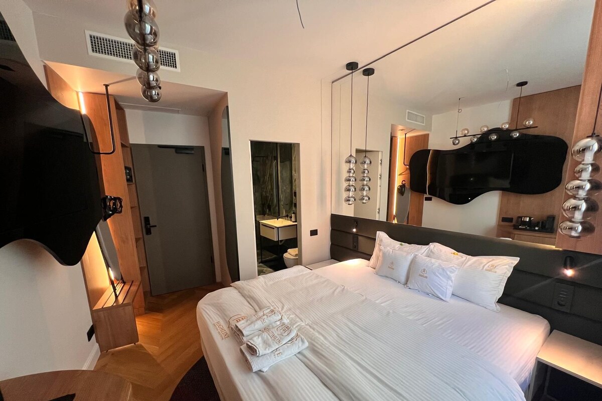 Premium bedding, down duvets, memory-foam beds, desk