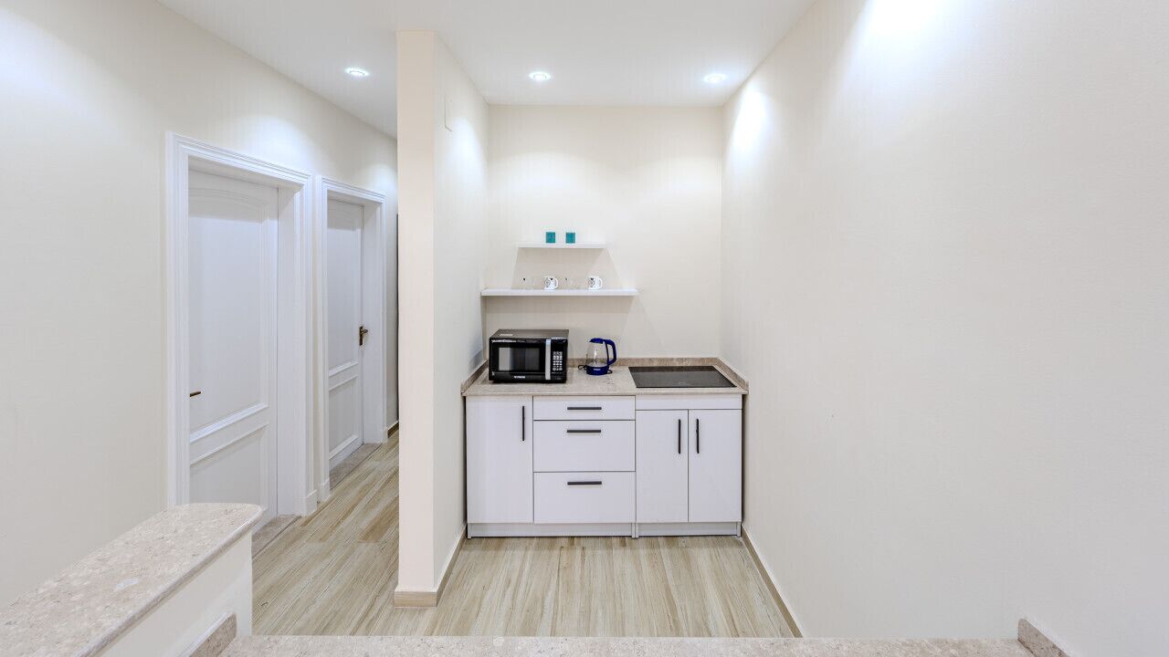Fridge, cookware/dishes/utensils, dining tables