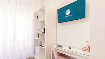 Deluxe Double Room, Balcony, City View | Minibar, in-room safe, desk, laptop workspace