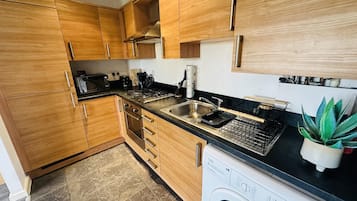 Apartment | Private kitchen | Fridge, microwave, oven, stovetop