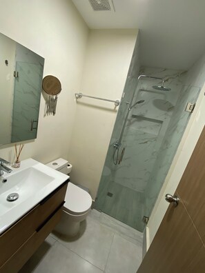 Hair dryer, towels, soap, toilet paper