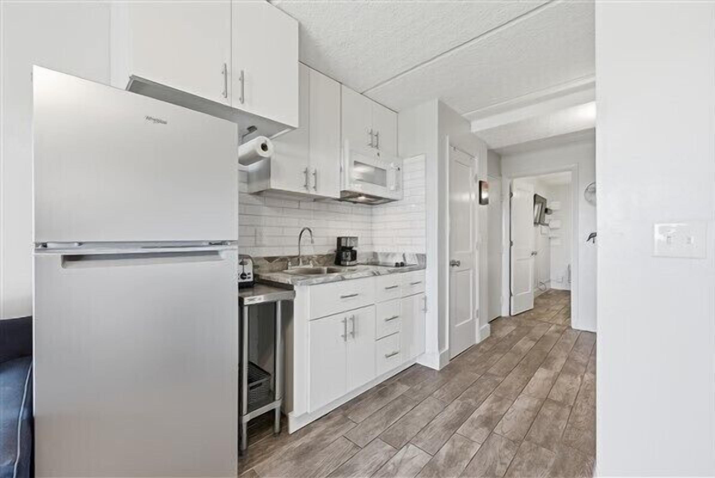 Fridge, microwave, coffee/tea maker, toaster