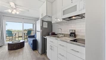 Fridge, microwave, coffee/tea maker, toaster