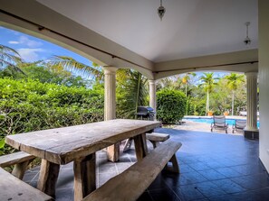 Outdoor dining - Cheerful villa with pool minutes from city center. Only 10 mins away from POP (Sosua)
